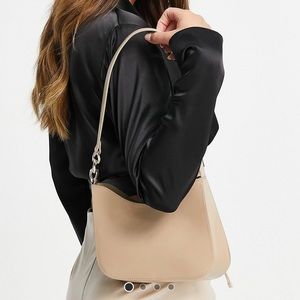 ASOS DESIGN curved shoulder bag with chain link strap in beige